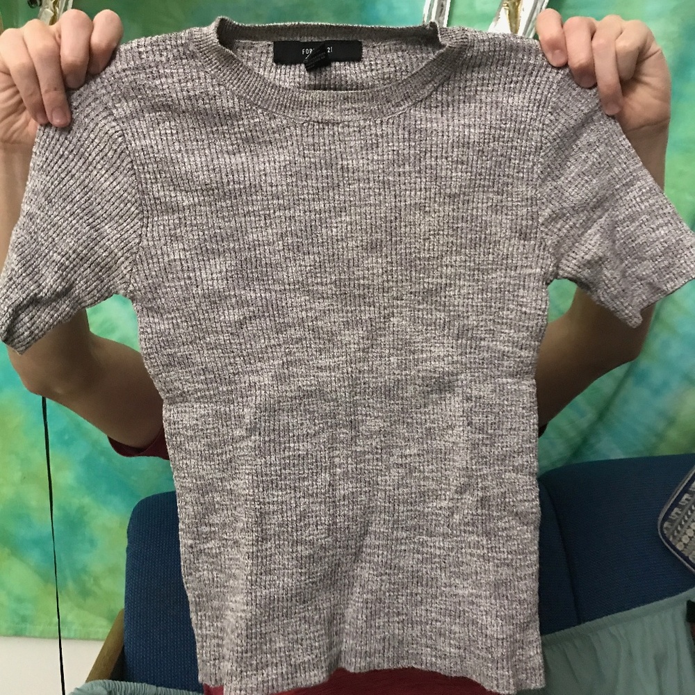 Basic light purple shirt.